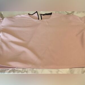 A gently used light pink Zara top in size XS.